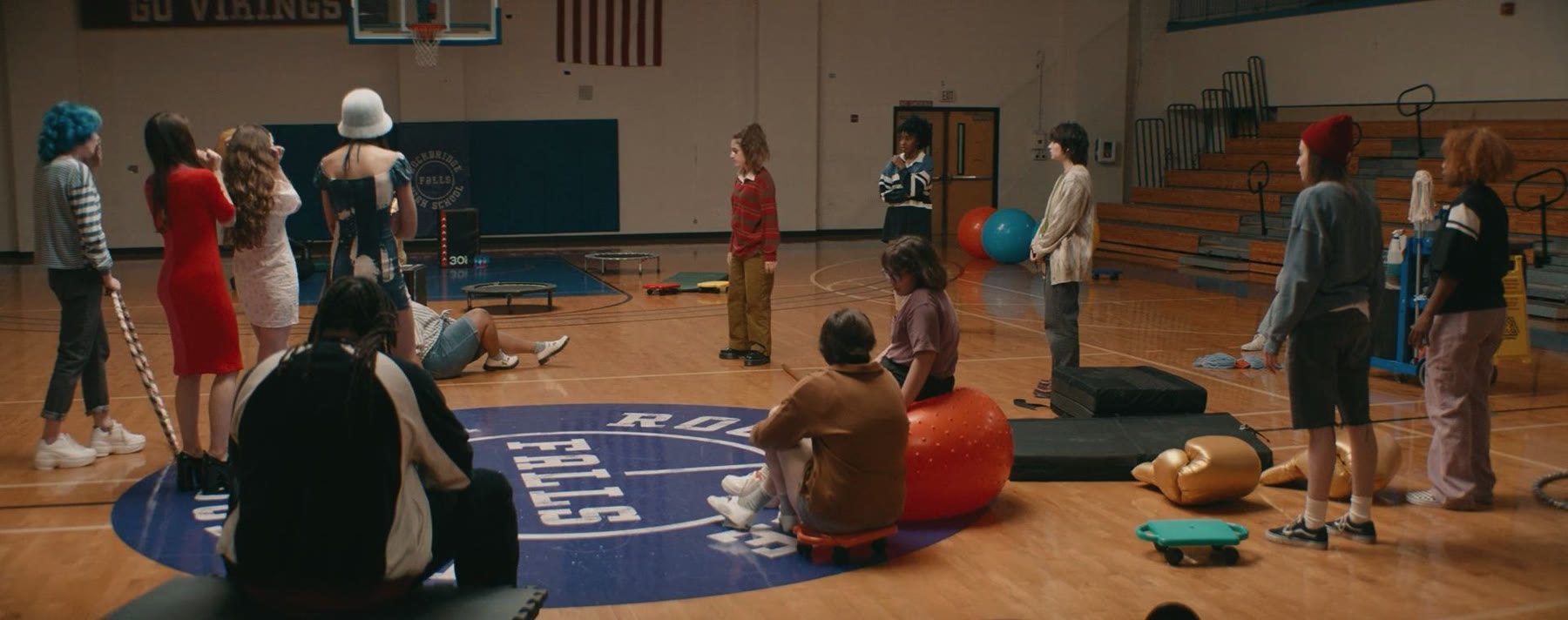 A queer basketball league in a school gym